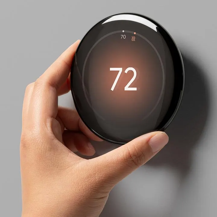 Smart thermostat on a wall