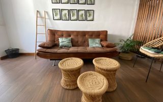 brown wicker round basket on brown wooden table