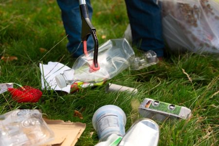 Person doing community service by collecting trash