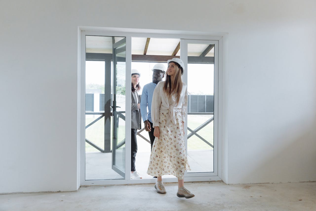 People inspecting a new home layout.