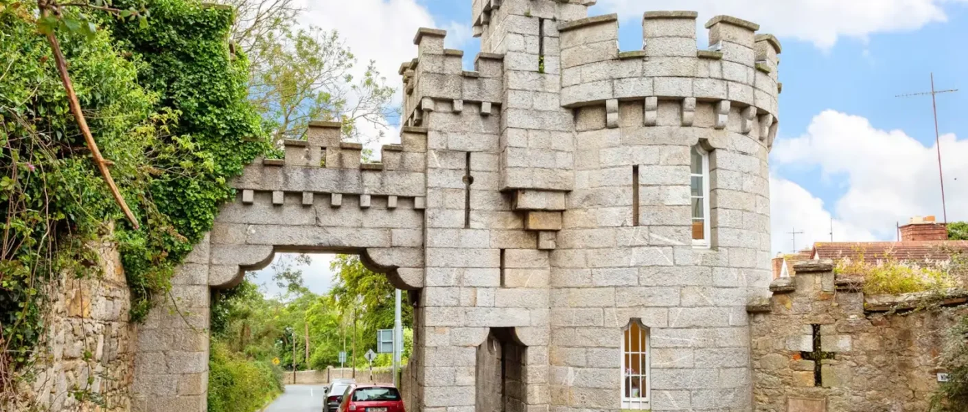Manderley Castle exterior view with turret overlooking Killiney Bay.
