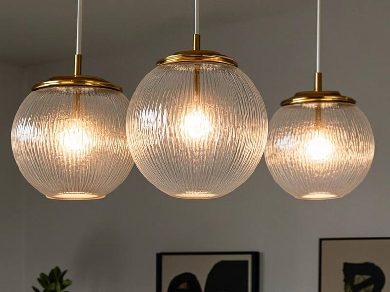 Artisan handblown glass pendant lights adding elegance to a modern living space